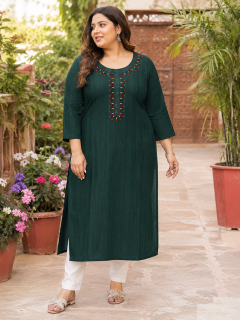 Elegant deep green embroidered plus-size kurti with a classic round neckline and subtle striped detailing — kurti only, pants not included.
 slight variation in color & design is possible