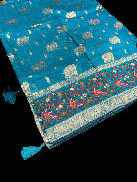 Organza silk very soft brocade saree with stone work and tessels attach on Pallu