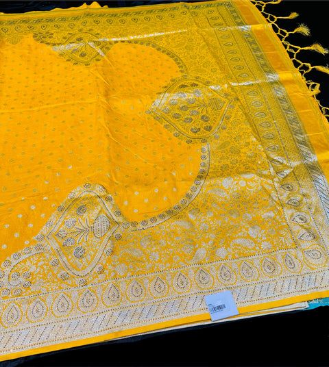 Soft Banarasi Silk brocade saree with stone work and tessels attach on Pallu and contrast brocade blouse piece