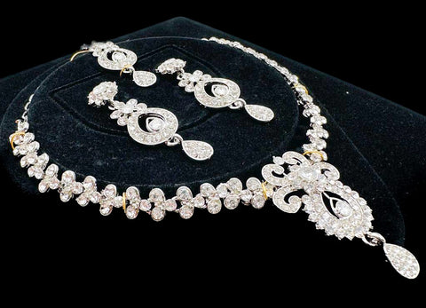Silver color Jerkan stone studded beautiful necklace set with Earrings & Tikka