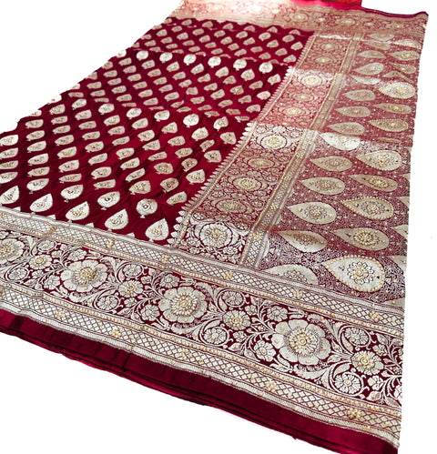 Beautifully designed Banarasi Silk Saree with heavy Handwork with stones & Zari