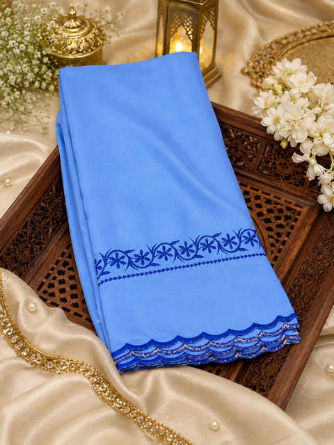 Elegant Hazoori Saropa crafted in rich light blue fabric, adorned with traditional white embroidery and a delicate scalloped border.Size (around 216cms lenth / 84 cms wide)
