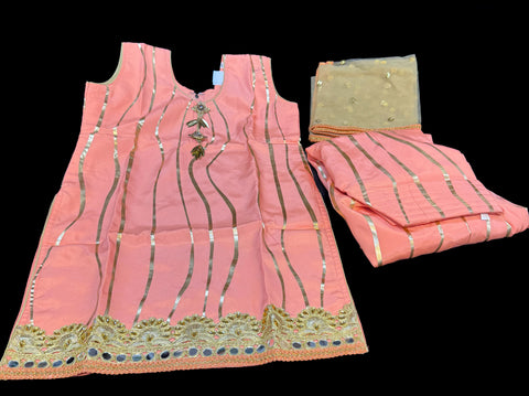 Peach colour crepe silk based kids punjabi suit with golden dupatta