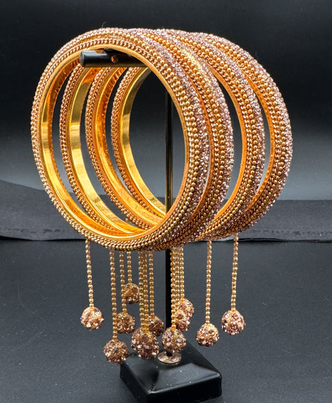 Beautiful Golden fine stone shiny Brass Bangles with Beautiful Latkan set (Sample picture attached at end to show it can be customised with plain Velvet or Metal Bangles)set of 4 Bangles