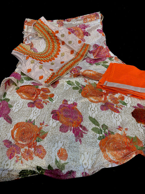 Golden silk based embroidery & stone work blouse with golden cream colour printed shimmery silk lehnga with dupatta
