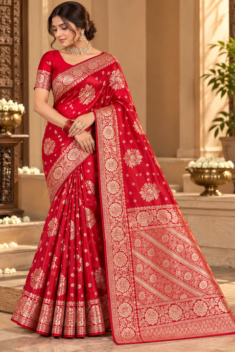 Luxuriously soft silk saree with a smooth, lightweight feel and beautifully flowy drape. Featuring rich woven zari floral motifs and an elegant detailed border .Blouse piece included. Slight variation in colour and design is possible.