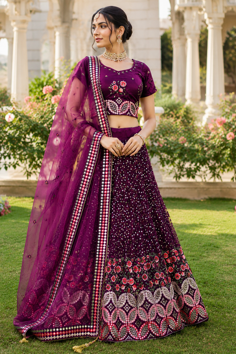 Size 44(upto 46) Elegant deep wine velvet lehenga featuring intricate floral embroidery, mirror detailing, and heavy sequin work, paired with a soft net dupatta with embellished borders( slight variation in color and design is possible)