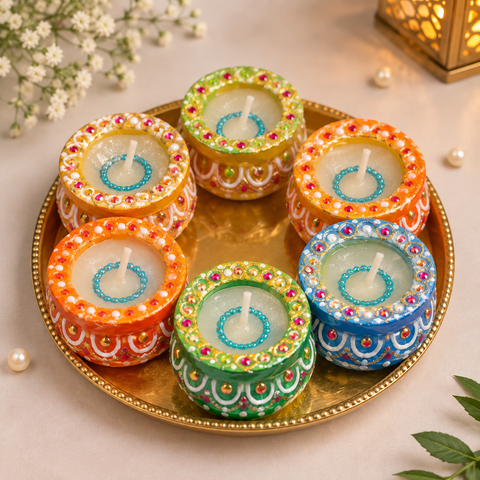 Beautiful 6-Piece Diya Candle Set with colourful handcrafted design and wax candles inside, perfect for Diwali décor and gifting. Slight handmade variations may occur.
