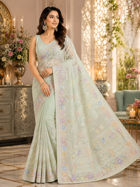 Pure Georgette Saree with beautiful pastel multicolor embroidery, rainbow sequins and delicate threadwork. 
Model blouse is for reference only. Blouse piece is attached with the saree. Slight variation in colour and design may occur.