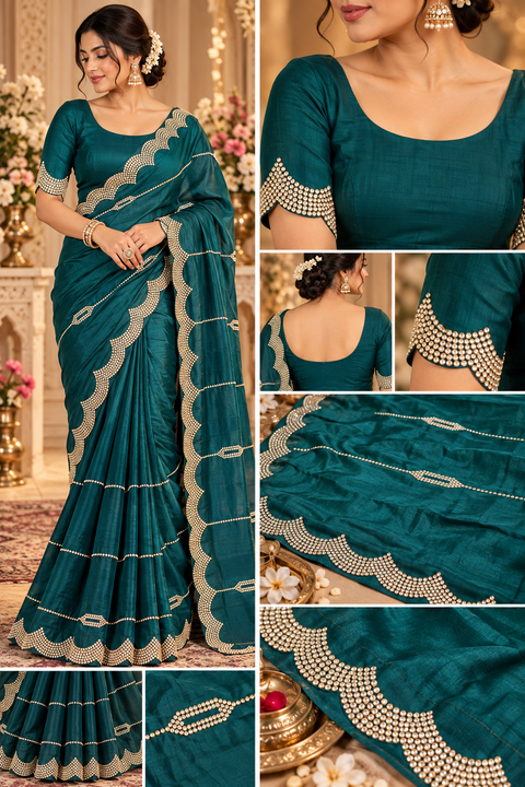 Soft Shiny Georgette Saree with a beautiful flowy drape, elegant stonework lines and a rich scalloped stone border. Attached blouse piece included; model blouse is for reference only. Slight variation in colour and design is possible.