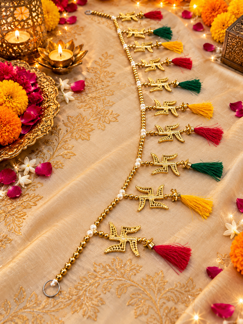Festive Diwali Door Toran – Beautifully designed with colourful pom-poms, pearl detailing and elegant golden hanging accents. Slight variation in colour and design may occur