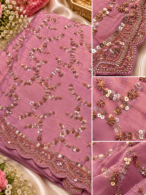Fendi Silk Saree featuring all-over intricate handwork,sequin detailing and a heavily embellished scalloped border for a rich festive look. Attached blouse piece included; model blouse is for reference only. Slight variation in colour and design may occur