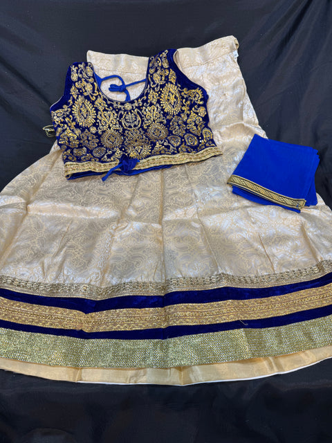 Dark Maroon colour velvet based blouse with embroidery & Stone work with golden brocade silk Lehnga & netting dupatta
