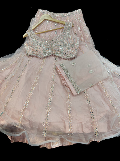 (Video clip attached)Heavy hand work designer stylish Blouse with very very heavy flared netting based  princess style lehnga and dupatta