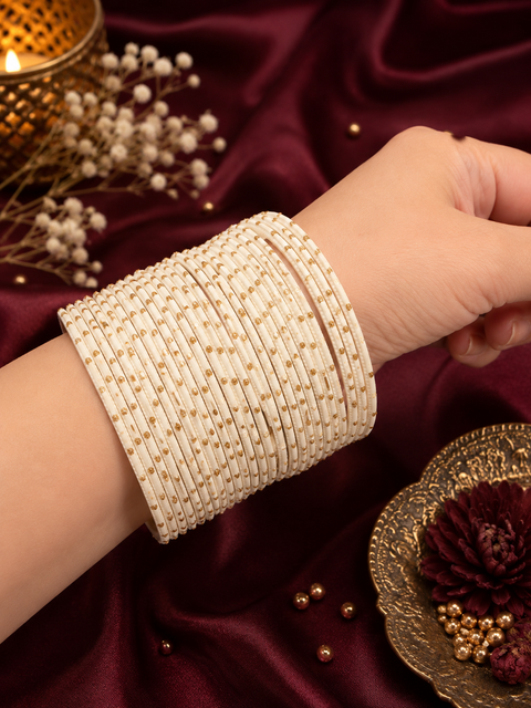 Golden Shimmer dotted metal bangles 2 dozen in 1 Set (slight variation in color & design may occur)