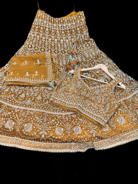 Stylish hand work heavy design crop top blouse with heavy work multiflared lehnga and netting dupatta