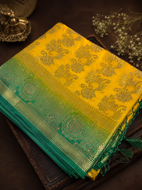 Premium Art Silk Saree Featuring Elegant Zari Weaving & Stone Work Throughout; Saree Comes With An Attached Blouse Piece. Model Blouse Is For Reference Only. Slight Variation In Colour And Design May Occur