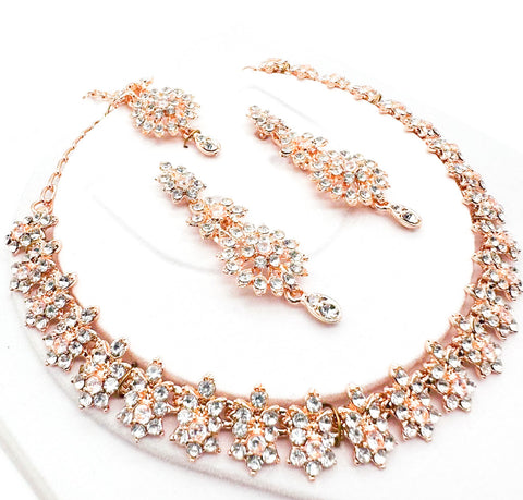 Rose gold color Jerkan stone studded beautiful necklace set with Earrings & Tikka