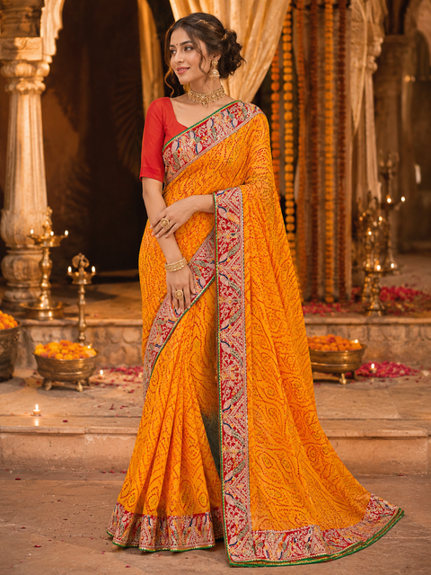 Bandhani print Beautiful Saree with embroidery peacock border all over The Blouse Worn By The Model Is For Reference Purposes Only. The Blouse Piece Is Attached Separately With The Saree. Slight Variation In Color And Design May Occur.