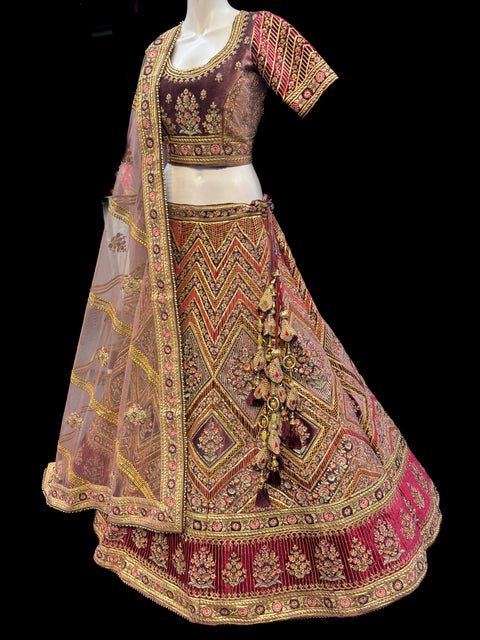 (Video clip attached)size42(upto 46)Pastel Purple mauve shade velvet based heavy embroidery & gotta patti work with golden stone & maroon with pink Mint colour flower design very heavy super big flared heavy ken designer Bridal Lehnga with bigger tessels