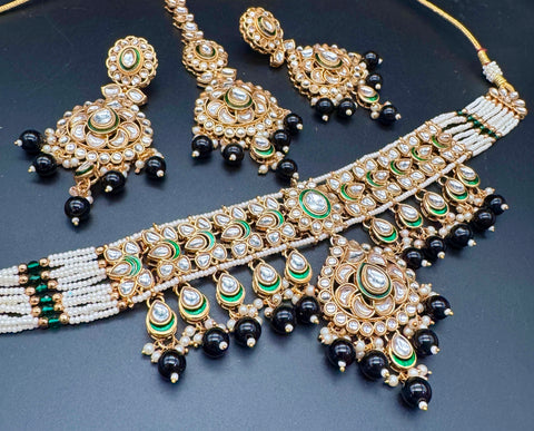 Beautiful Kundan and pearls work classy choker set with beautiful earrings & Tikka