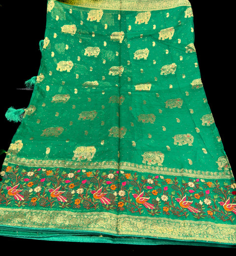 Organza silk very soft brocade saree with stone work and tessels attach on Pallu