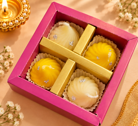Modak -Inspired Candle Set with silver foil-style detailing, perfect for Diwali décor, pooja and gifting. Slight variation in shape or finish may occur