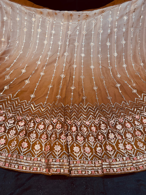 Ombré shades Netting based embroidery work multiflared beautiful lehnga with embroidery work design in blouse and embroidery dupatta (Unstitched Lehnga)
