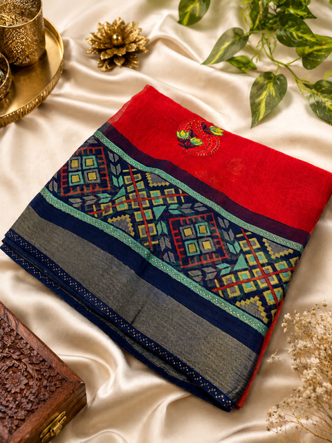 Red and nevi blue colour very soft crepe georgette beautiful print saree with fine stone work. Blouse Worn By The Model Is For Reference Purposes Only. The Blouse Piece Is Attached Separately With The Saree. Slight Variation In Color And Design May occur