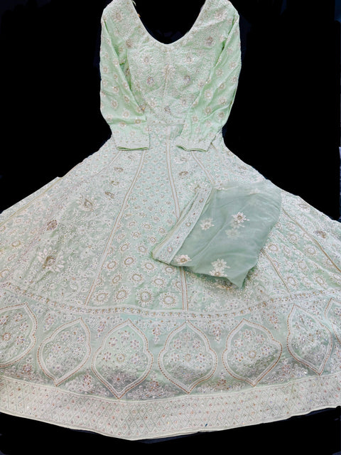 (Video clip attached)Chiffon georgette Based bridal style heavy design stones work With heavy embroidery Work at front and back Designer Flared Kameez /Gown And netting Based Embroidery Work heavy Dupatta