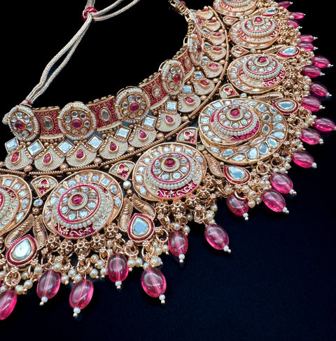 (video clip attached)Pastel Pink on Rosegold shade base Original Kundan Polki stones with Meenkari & Pearls work Bridal necklace with beautiful Jhumka, tikka , 2 Rings NOTE:- original Kundan Polki stones not fake plastic stones)
