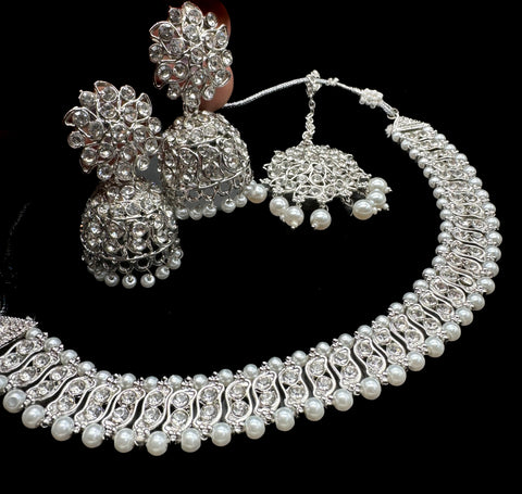 Silver color Beautiful jerkan stone with pearls beaded necklace with jhumka and tikka set