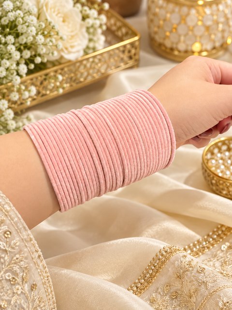 Elegant velvet bangles in a rich Muted Pink shade, perfect for festive, bridal and traditional looks. Each pack includes 3 dozen bangles (36 pieces). Price is per pack. Slight variation in colour may be possible