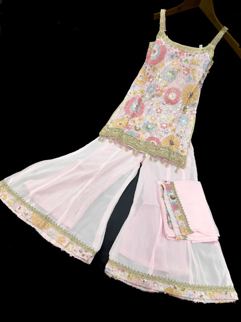 (Video clip attached)Pastel Pink color  Pure and soft georgette based sequined with embroidery & tessels work girls sharara suit with dupatta