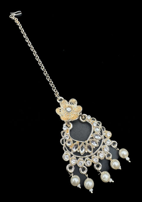 Lite gold color kundan with pearl work beautiful tikka