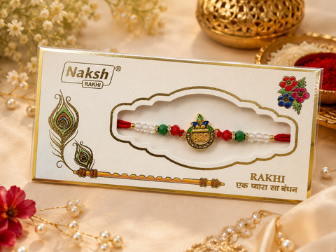Elegant handcrafted Rakhi with premium beads and sparkling stonework, beautifully crafted to celebrate the special bond of love and protection.