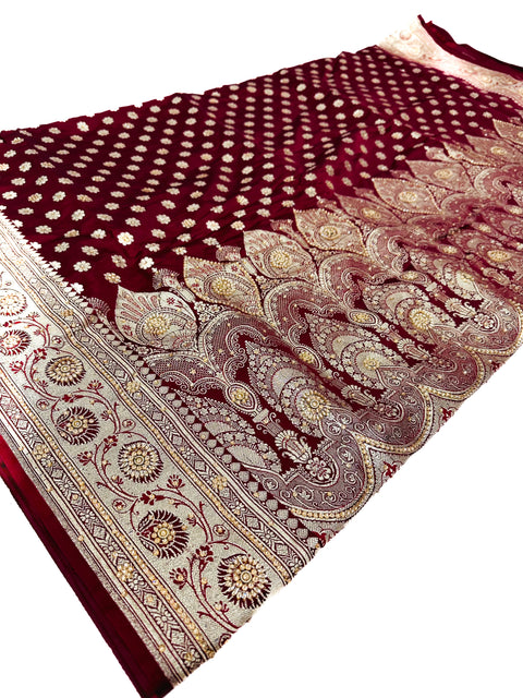 Beautifully designed Banarasi Silk Saree with heavy Handwork with stones & Zari