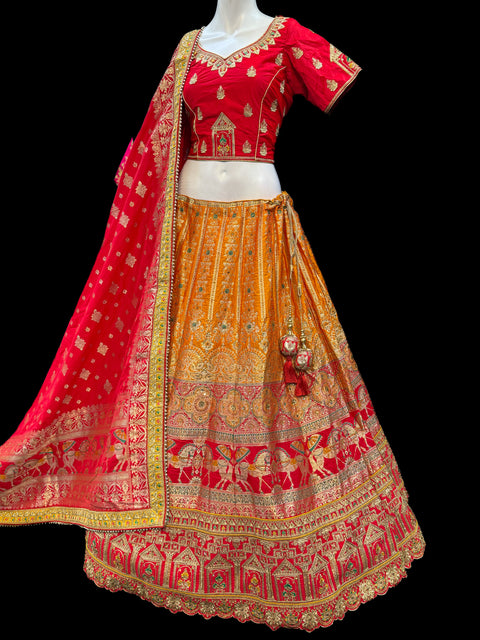 (Video clip attached)SIZE 42 (Upto 44))Mustard & Red Banarasi silk Based Beautiful hand Embroidery Work With Golden Fine Stones work heavy Ken Ken Designer semi/Bridal Lehnga With Heavy Tessels Attached To Blouse & Lehnga