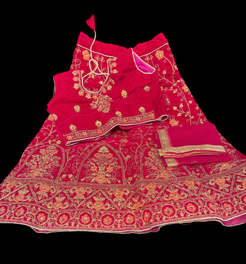 Magenta color Velvet based Stone work with embroidery work lehnga with embroidery work beautiful Blouse and netting dupatta