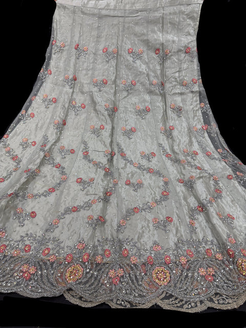 Netting based Golden stones and embroidery work all over front & back of kameez with stone work and beautiful lehnga & netting dupatta (Size 42 and can be altered upto 44)