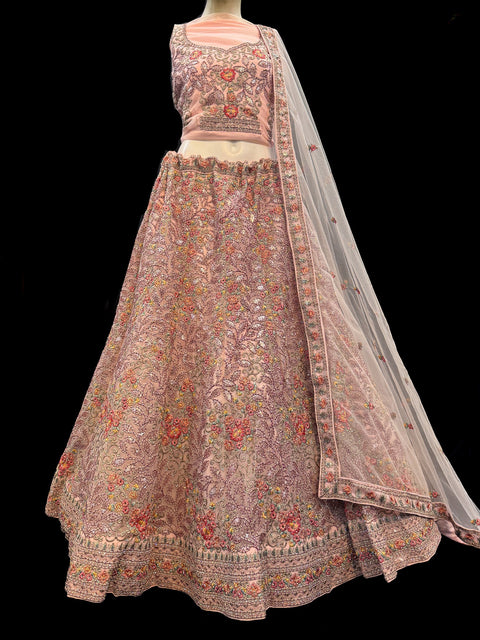 (video clip attached) Netting based embroidery work with heavy sequins and stone work Heavy Ken ken designer lehnga with heavy handwork blouse and netting dupatta