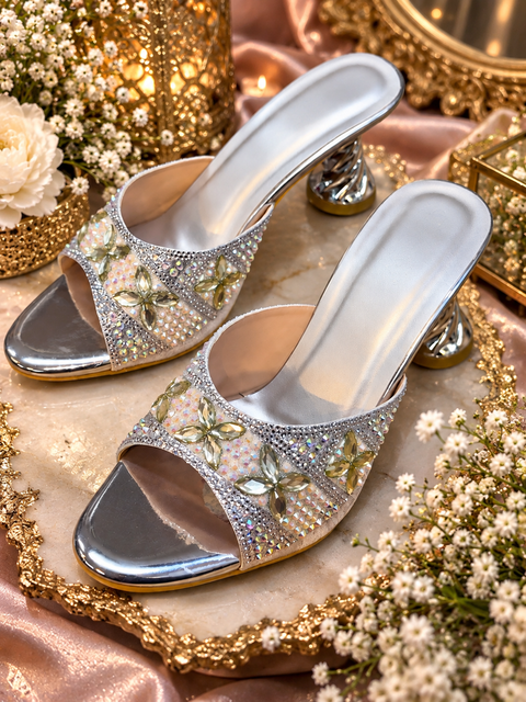Elegant silver heels featuring sparkling crystal and stone work with a stylish open-toe design and comfortable mid-height heel. Perfect for weddings, parties and festive occasions.