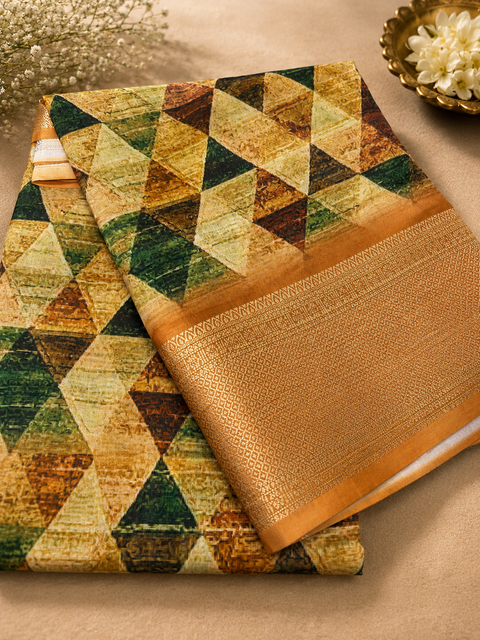 Elegant soft art silk saree featuring a vibrant abstract digital print, complemented with a rich gold zari woven border , Comes With An Unstitched Running Blouse Piece Attached To The Saree (Slight Variation In Color And Design Is Possible)