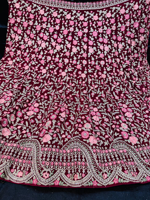 Maroon  colour Georgette based heavy embroidery work with stone work multiflared beautiful bridal lehnga with attached latkans And exact embroidery Potli Bag