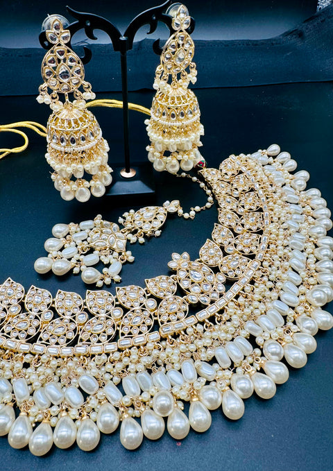 Kundan studded & pearls work designer heavy work Necklace set with beautiful Earrings & Tikka