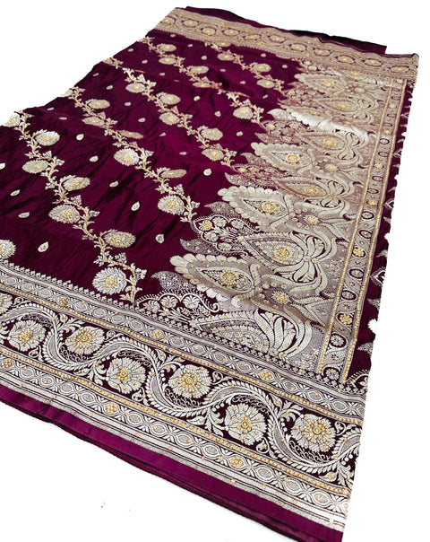 Beautifully designed Banarasi Silk Saree with heavy Handwork with stones & Zari
