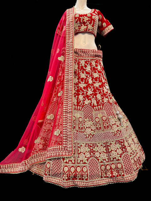 (Video clip attach)size 42(upto 46) fully stitched Red color full of embroidery and stones work blouse and all over heavy multi flared bridal wear lehnga with heavy work dupatta
