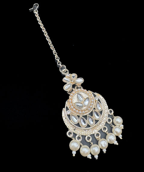 Lite gold color kundan with pearl work beautiful tikka