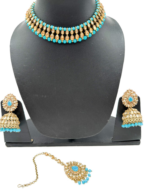 Golden stone with pearls studded simple Necklace with beautiful Jhumka & Tikka set