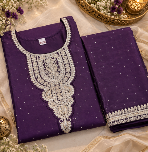 Georgette Silk suit set featuring elegant golden embroidery on the neckline, sleeves and hem, paired with matching pants and a beautifully bordered dupatta.Slight variation in colour and design may be possible.